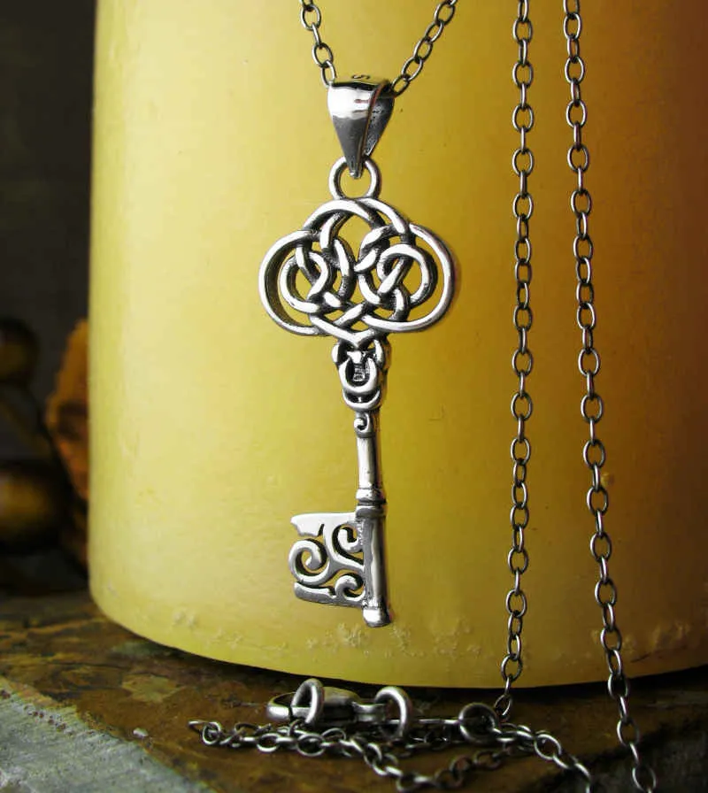 Old-Fashioned Celtic Key With Triskelion Pendant